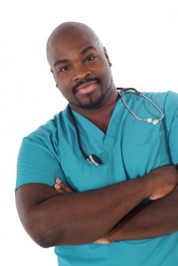 Male nurse with a stethoscope, isolated on white