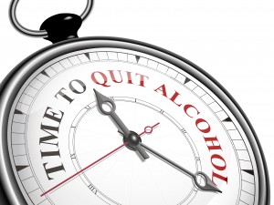 time to quit alcohol concept clock isolated on white background